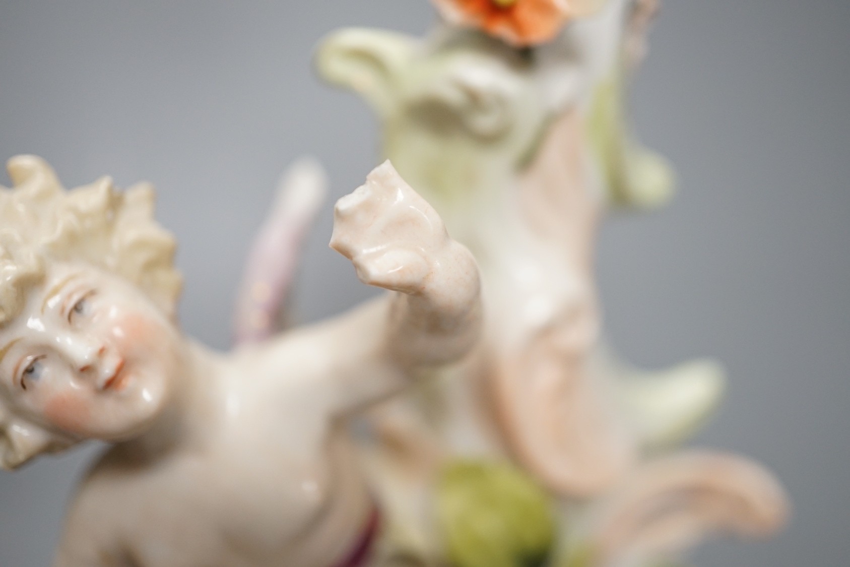 A Meissen flower painted pierced dish and two German porcelain candlesticks - 25.5cm tall